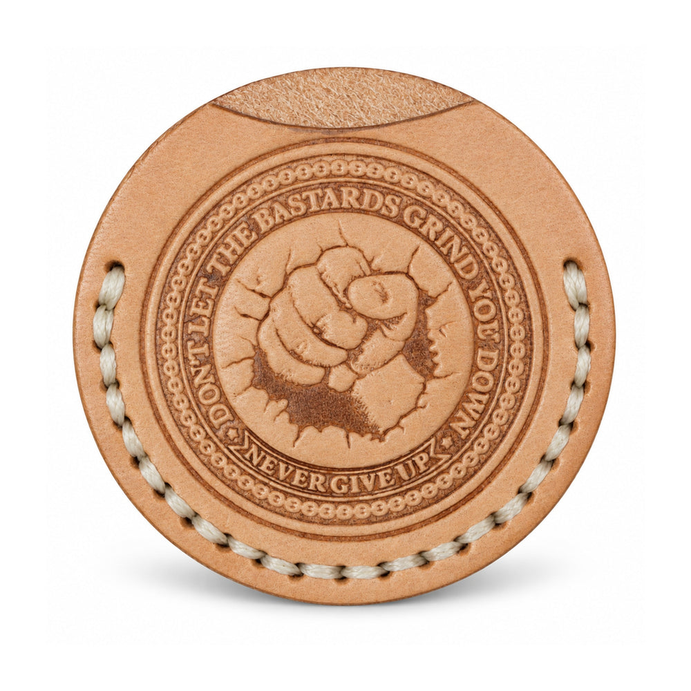 Never Give Up tan leather coin sleeve with embossed fist design and ivory stitching, front view